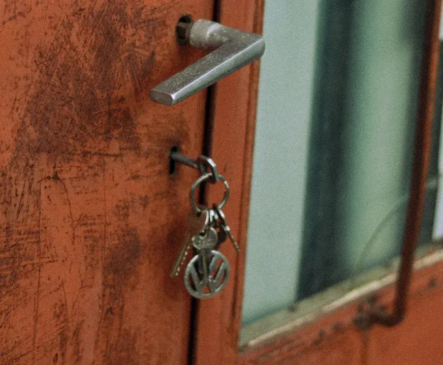 Keys hanging from the lock of an old door – why keys snap and when broken key removal Hastings is needed, Locksmith Hastings