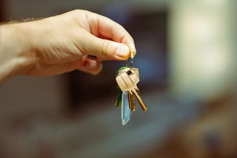 Hand holding a set of house keys – residential locksmith Hastings help for landlords and letting agents from Locksmith Hastings